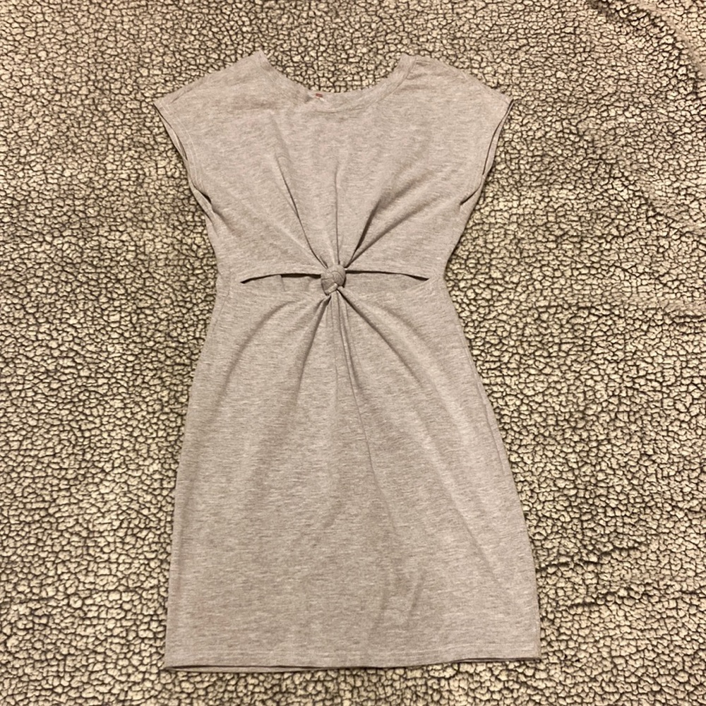 Grey cute stretch t-shirt dress with cut out in mid section.